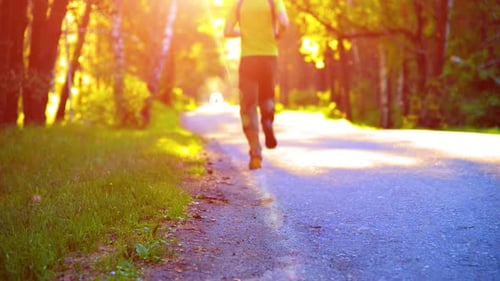 Sport Man Running at Asphalt Road