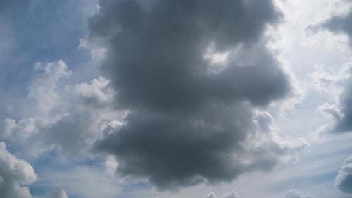 Time Lapse of Moody Gray Clouds in Blue Sky
