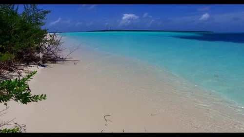 Aerial flying over landscape of luxury coast beach voyage by turquoise sea with white sandy backgrou