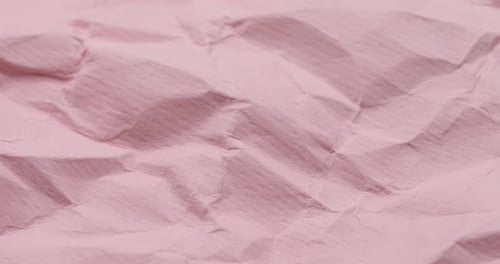 Pink Wrinkled Paper Texture Abstract Background
