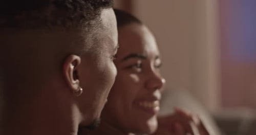 Black Man Watching Comedy with Girlfriend