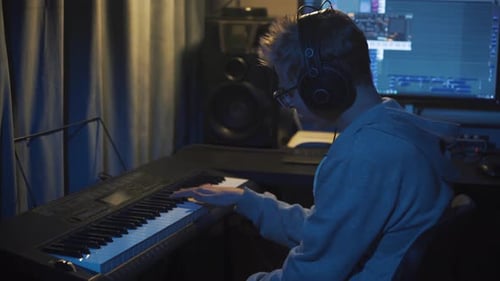 Teenager at Home Composes Music In His Home Sound Studio