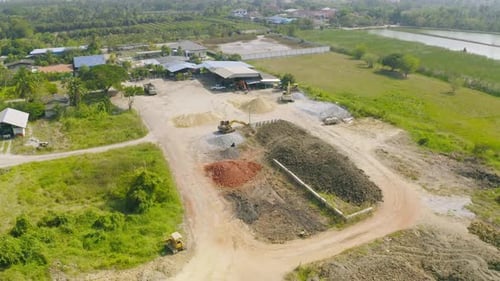 Aerial top view of dry ground rough cracks in the land with sand in factory industry