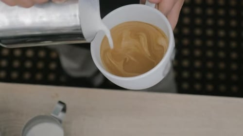 Coffee Artist Pouring Latte Art Close Up