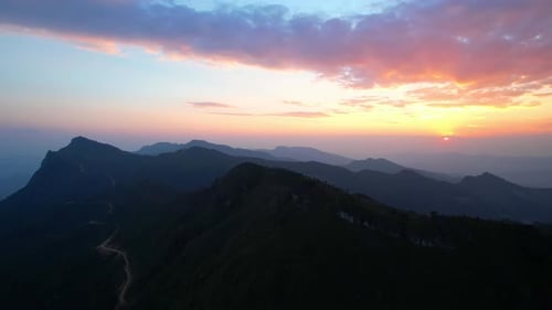 4K Aerial view over the mountains at sunset. Drone Flight Footage