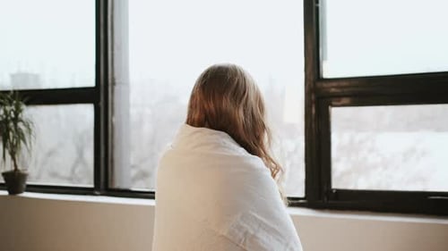 Portrait Of Young Red-Haired Girl By The Window.