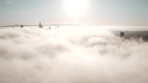 City Skyline Emerging from Fog, Aerial View