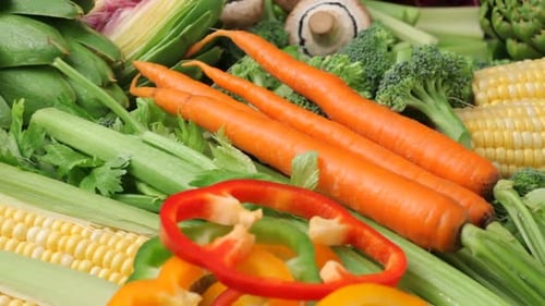 Fly over background of fresh vegetables