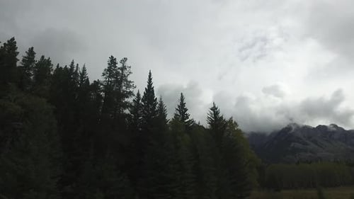 Scenic Mountains Under Cloudy Sky
