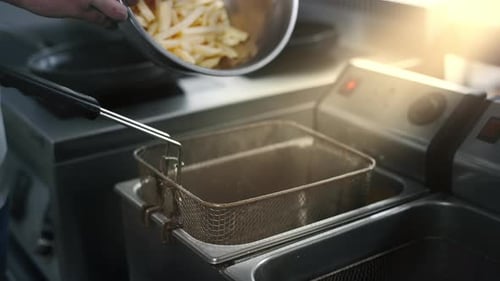 Chef Preparing French Fries for Deep Frying