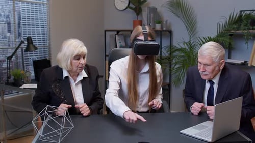 Colleagues Working with Virtual Reality Headset in Office