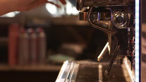 Flow of steam from professional espresso coffee machine in the cafe. Small business concept