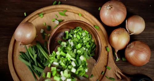 Pieces Green Onions To Shift the Cutting Board Into Bowl.