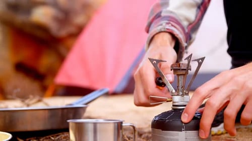 Close Up of Stove Being Lit in Nature