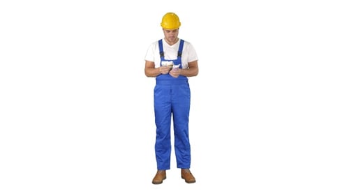 Builder counting money standing on white background.