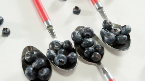 Close-Up of Fresh Blueberries in Spoons
