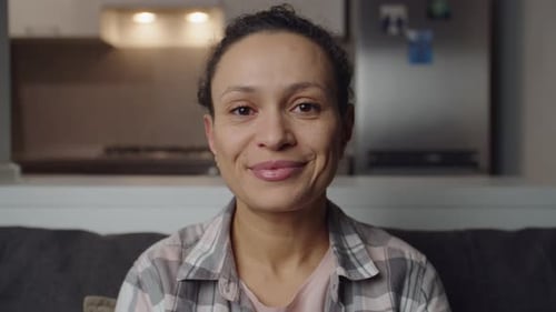 Woman Smiling in Close Up at Home
