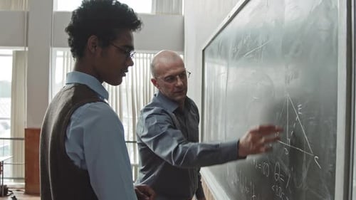 Professor Helping Student to Solve Geometry Problem