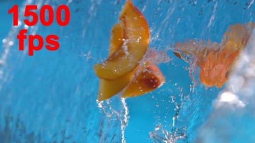 Fresh Fruit Splashing in Waterfall, Slow Motion