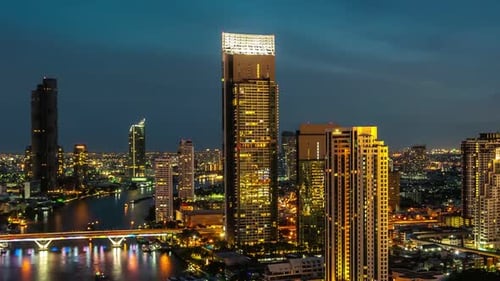 Time Lapse Night Cityscape and Highrise Buildings in Metropolis City Center