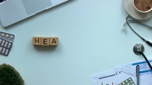 Healthcare Spelled Out On Doctor's Desk