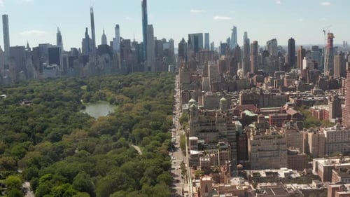 Flight Over Beautiful New York City Street at Central Park on Sunny Summer Day