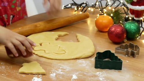 Child Making Holiday Cookies at Home