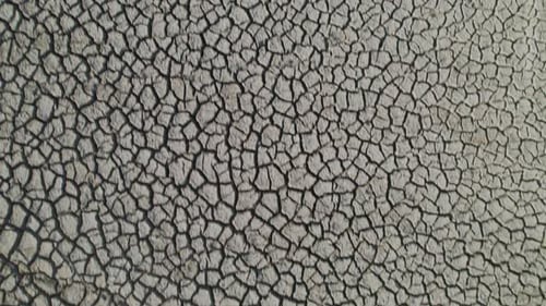 Aerial View of Dry Cracked Earth, Barren Wasteland
