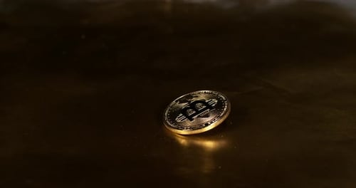 Bitcoins on Black Background, slow motion 4K