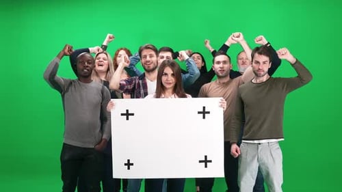 Diverse Group Raising Fists Holding Blank Sign
