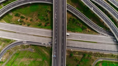 Aerial View of Complex Highway Interchange on Sunny Day