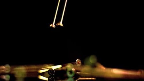 Silver Screws Falling in Slow Motion