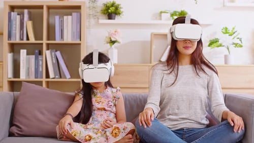 Mother and Child Enjoying VR at Home
