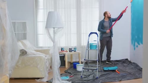 Man Renovating Apartment