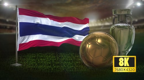 Thailand Flag Waving with Golden Football and Silver Trophy in Stadium