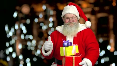 Santa Is Holding Gift Boxes.