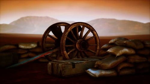 Historical Cannon and Sandbags In Desert Battlefield Scene