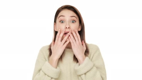 Young Woman Reacts with Shock and Surprise