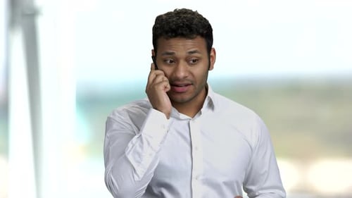 Man Talking on Phone With Varying Expressions