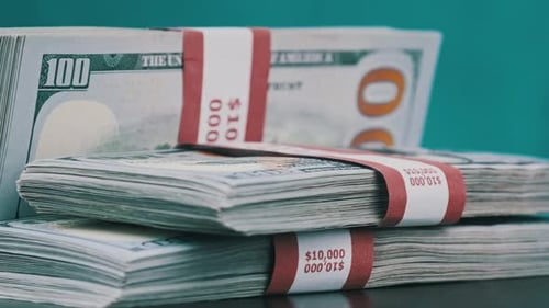 Stacks of Bundled Hundred Dollar Bills Close Up