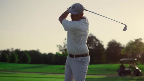 Excited Golfer Playing Golf on Field