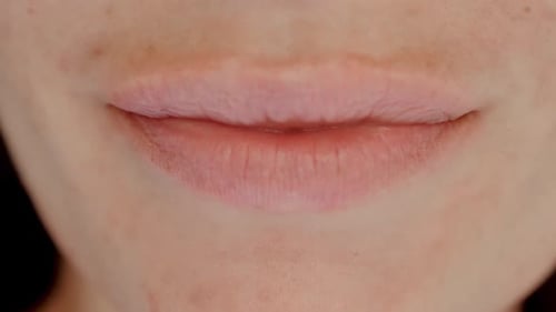 Woman's Lips Smile in Close-Up Detail