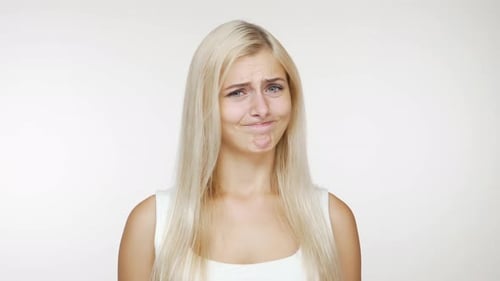 Portrait of Blondie Strict Woman Politely Expressing Denial Waving Head in Refusal Over White