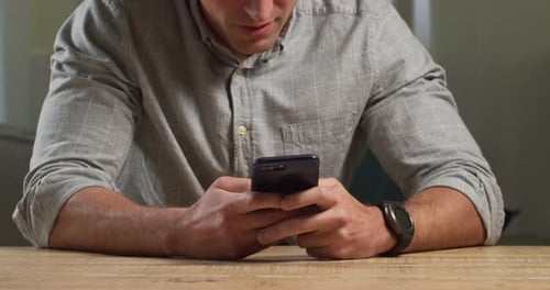 Caucasian man using his phone