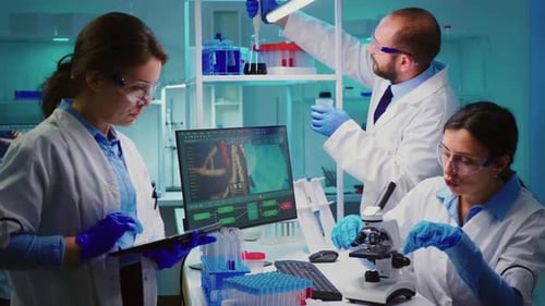 Scientists Conduct Research in Modern Medical Laboratory