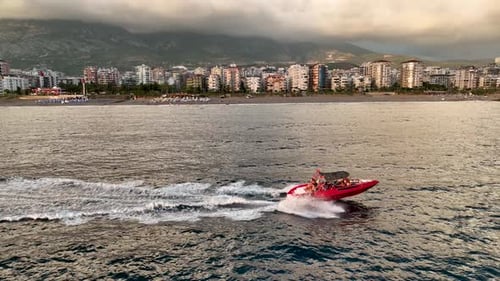 Sports boat sails fast on the sea aerial view 4 K