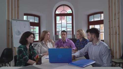 Team Having Meeting in Urban Workplace