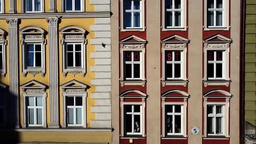 Facade of a European city building. Elements of architecture. Aerial drone view.