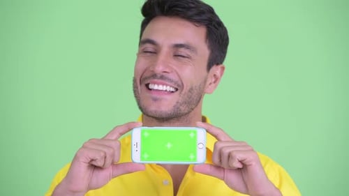 Man Holding Phone With Green Screen Template