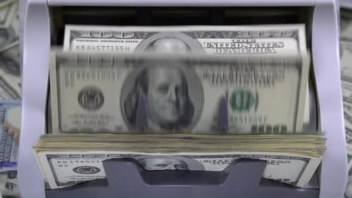 Hundred Dollar Bills Processed in a Money Counter